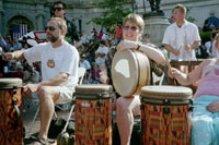 Toni Kellar, center, and husband Steve and daughter Kayla perform at "Symphony For 1000 Drums" in Cleveland July 2006.